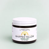 Jar of Summer Dawn Organics Whipped Tallow on a light green background