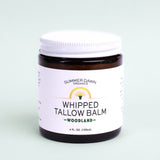 Jar of Summer Dawn Organics Whipped Tallow Balm on a light green background